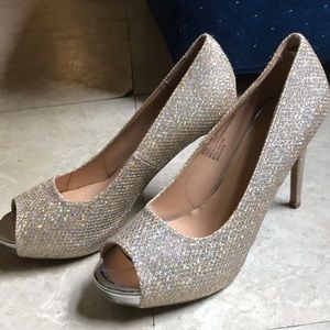 XO peep toe sparkly pumps